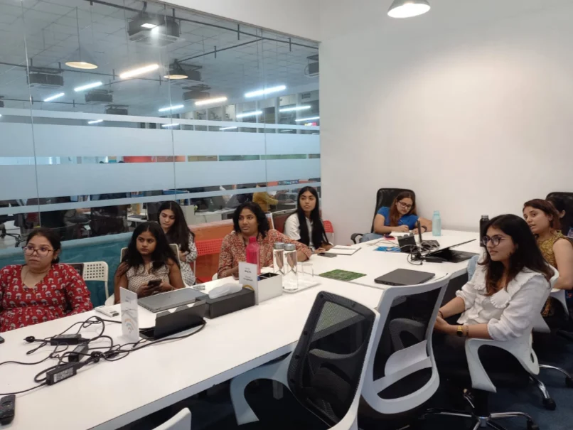 Employees attending a Trijog workshop in a conference room