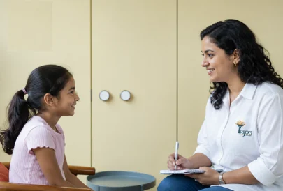 Child therapist working with a young girl