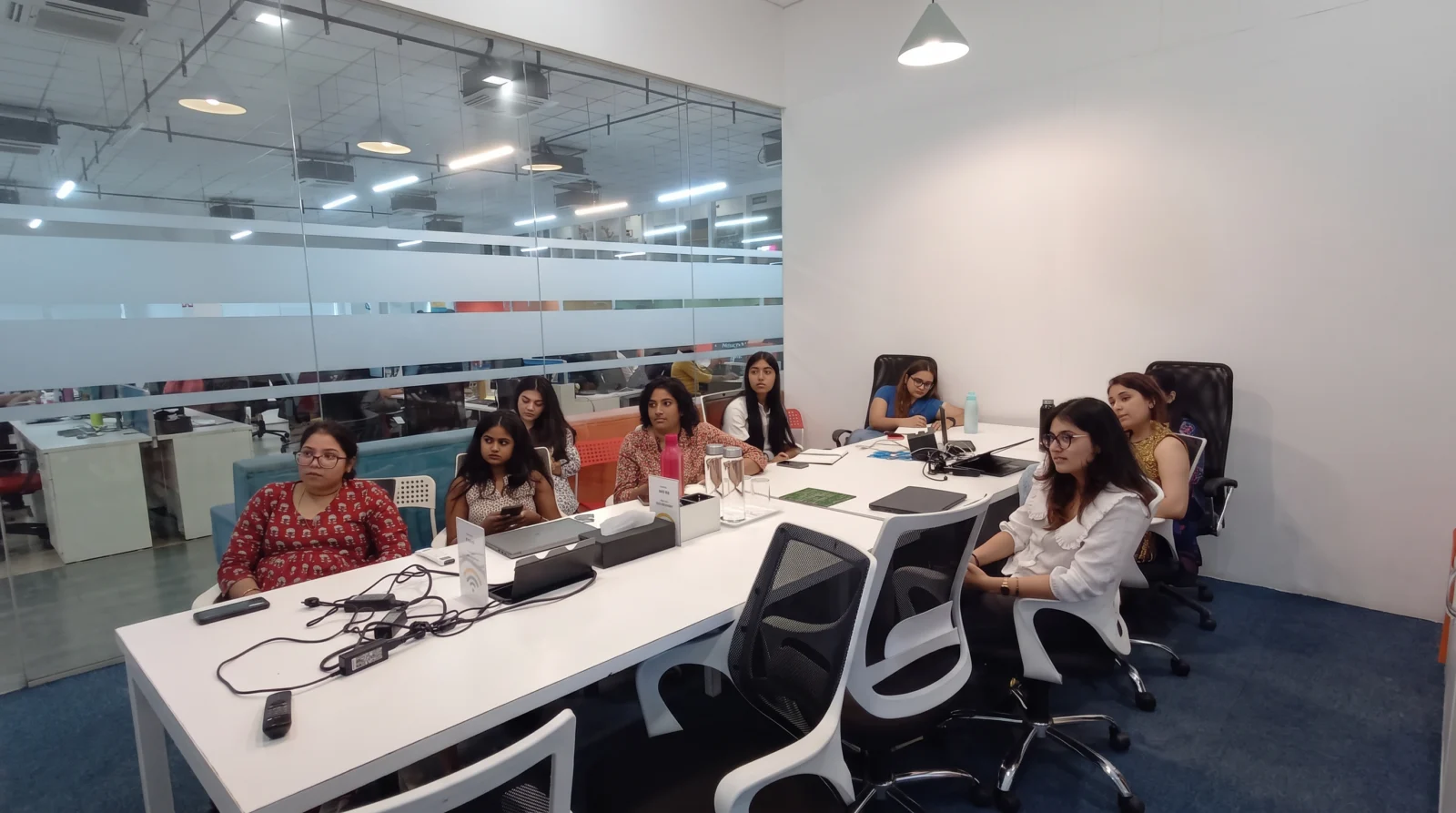 Employees attending a Trijog workshop in a conference room
