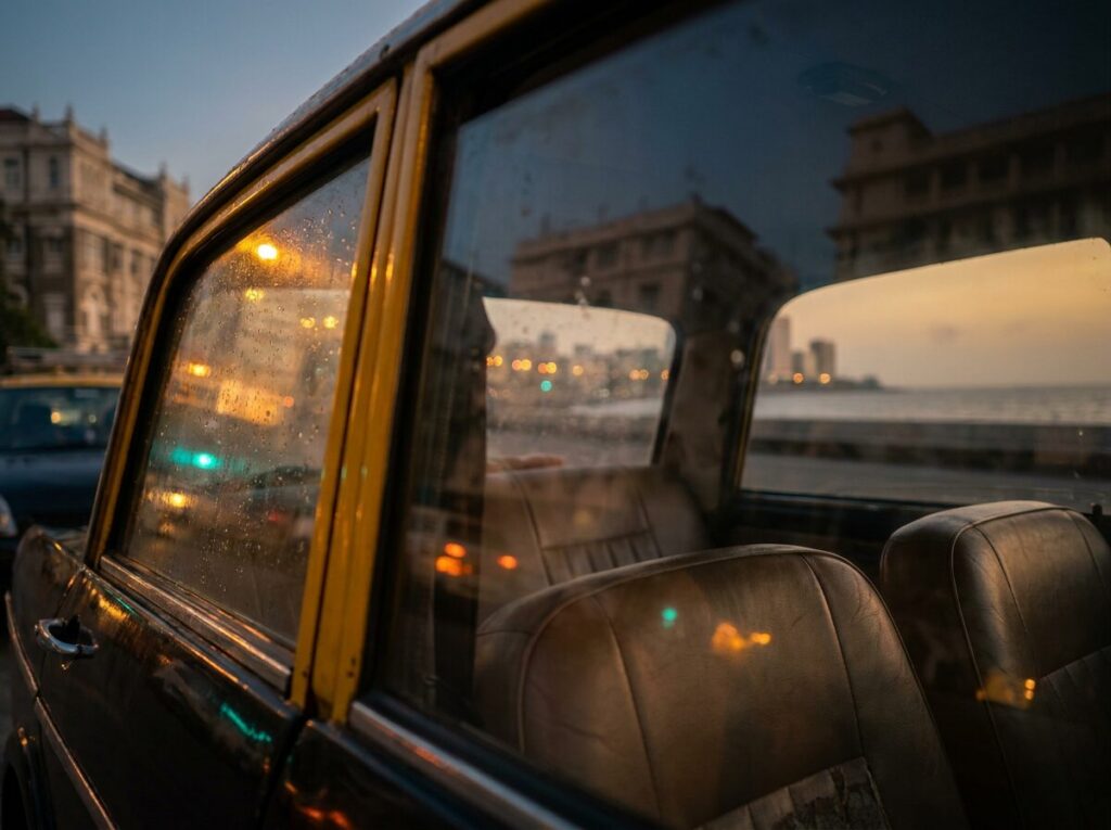 Evening city lights seen through a cab window in Mumbai